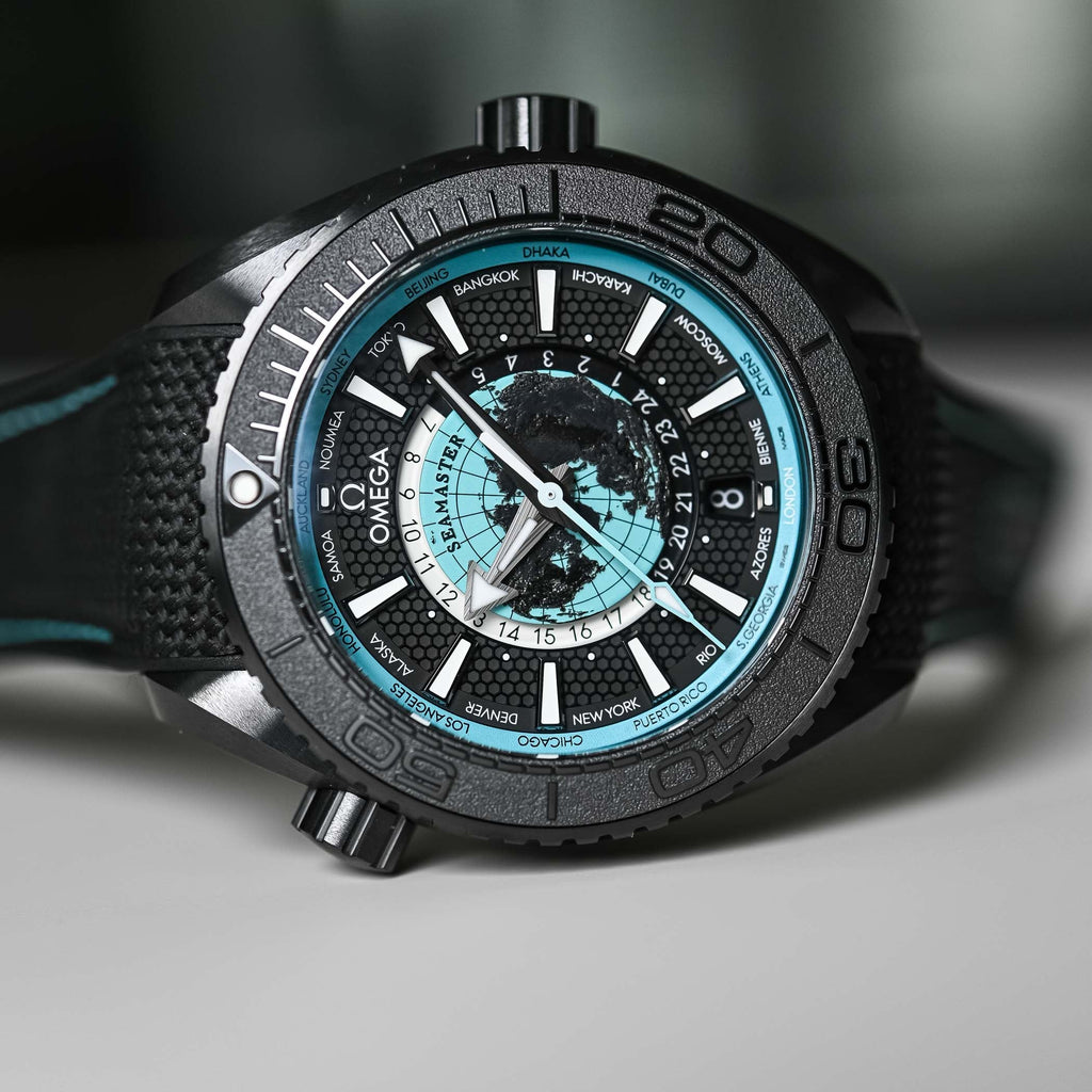 Luxury Swiss Watch | Planet Ocean Worldtimer | Automatic GMT | Black & Turquoise Dial | 904L Stainless Steel Case | Fabric Strap